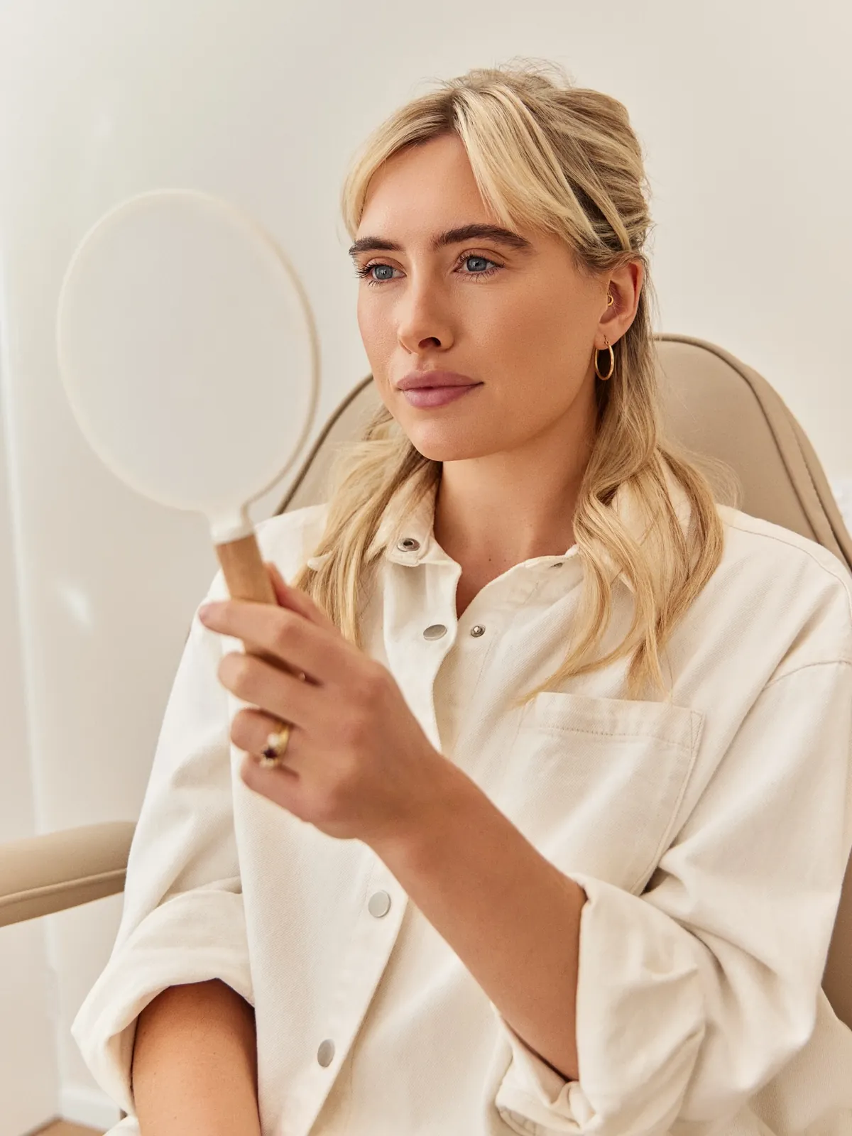 Patient reviewing results in the Butter Cosmetic + Skin treatment room